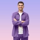 young-male-teacher-standing-with-crossed-arms-wea-2024-10-17-21-44-51-utc.jpg